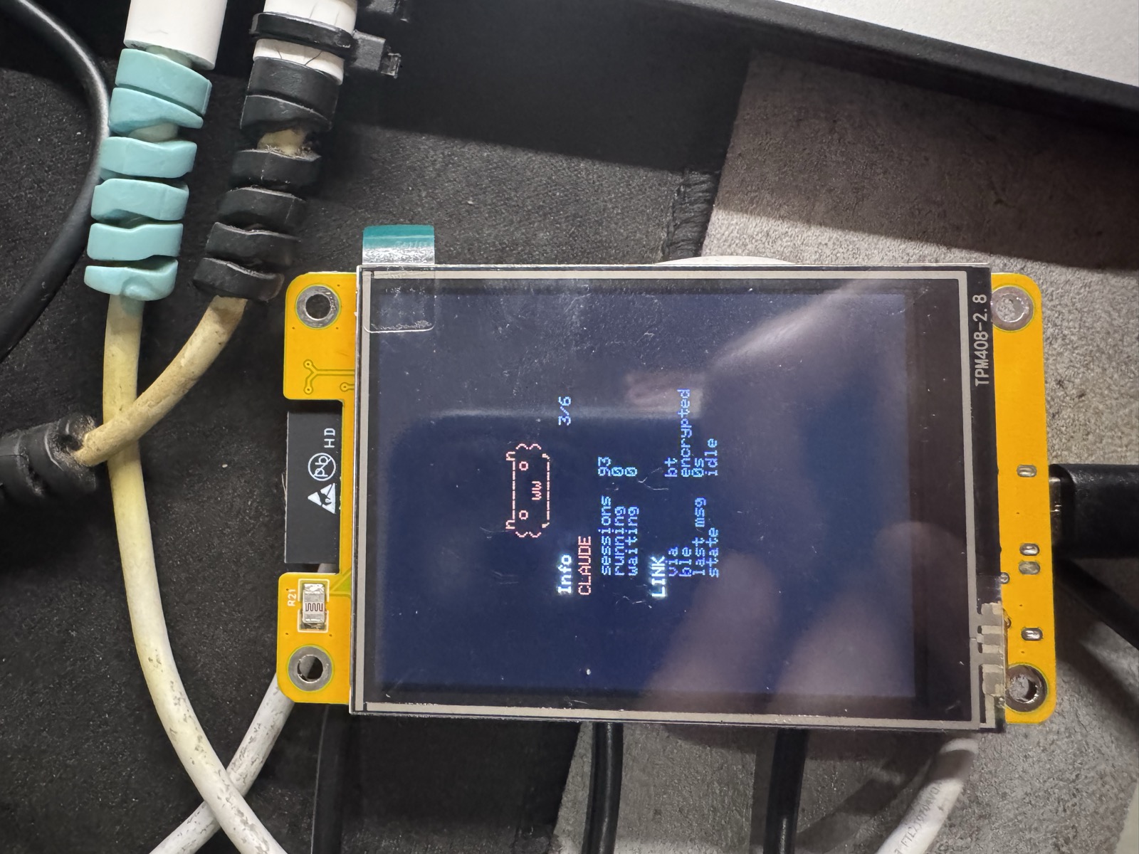 The buddy's info screen showing session counts and an encrypted BLE link